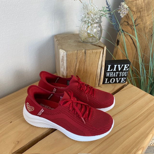 Rød Skechers Slip-ins med glimmer detaljer.