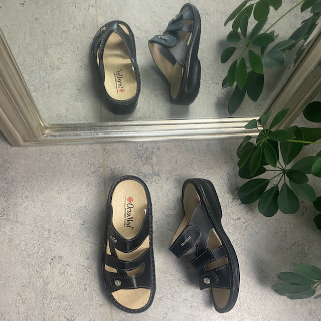 Sort skind slip on til knyster