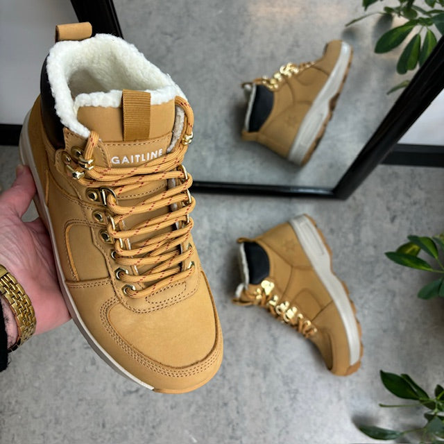 Brun vinterstøvle fra Gaitline med gængesål