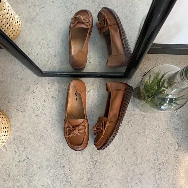 Elegant ballerina i brunt skind