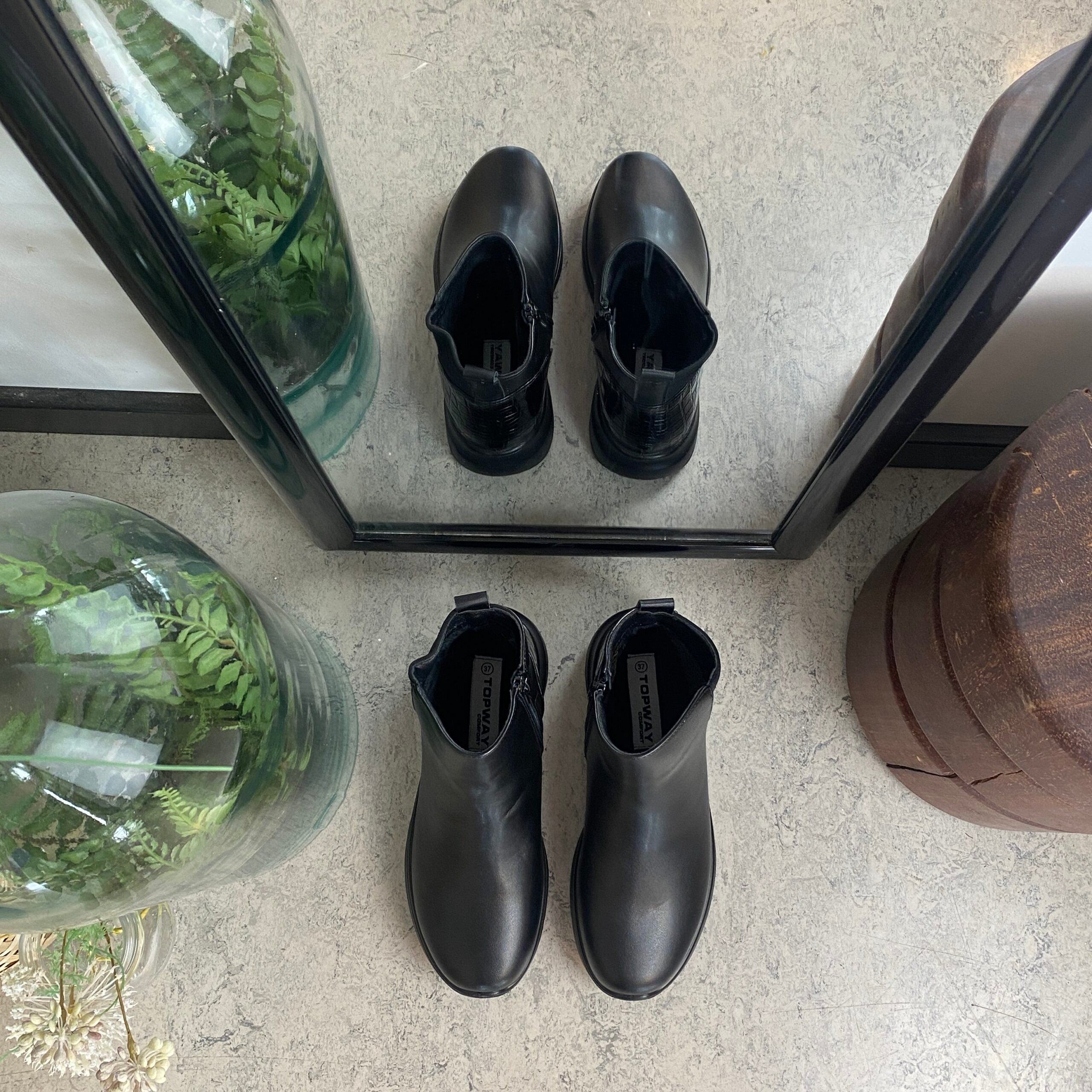 Sort støvle med lynlås