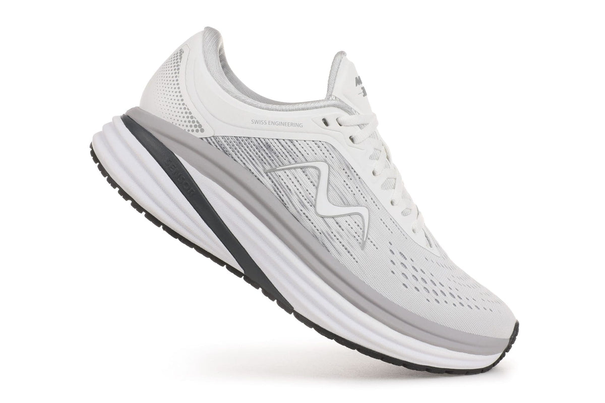 Hvid og sølv MBT M-3000 dame sneaker med tyk rullesål set fra siden på hvid baggrund.