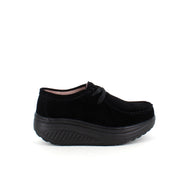 Sort ruskindssko med gængesål og svangstøtte