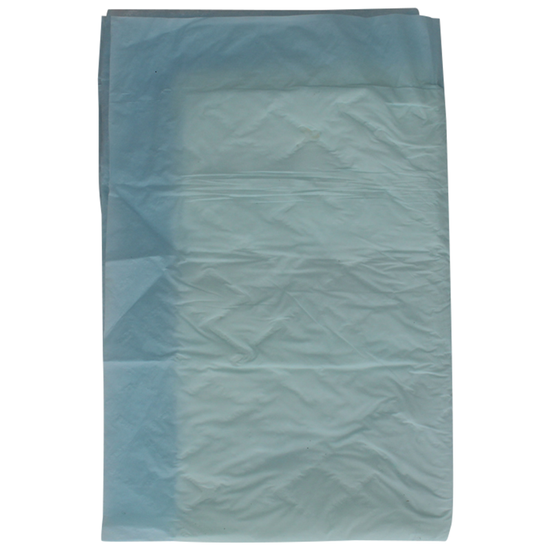Blå underlag til seng og stol – engangsbeskyttelse ved inkontinens