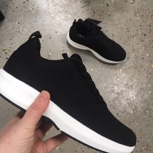 Strikket Gaitline i sort med hvid bund