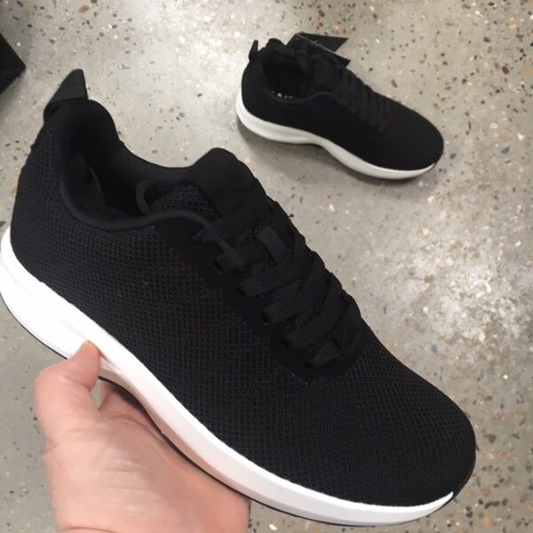 Strikket Gaitline i sort med hvid bund