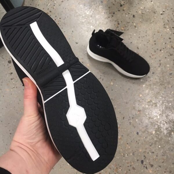 Strikket Gaitline i sort med hvid bund